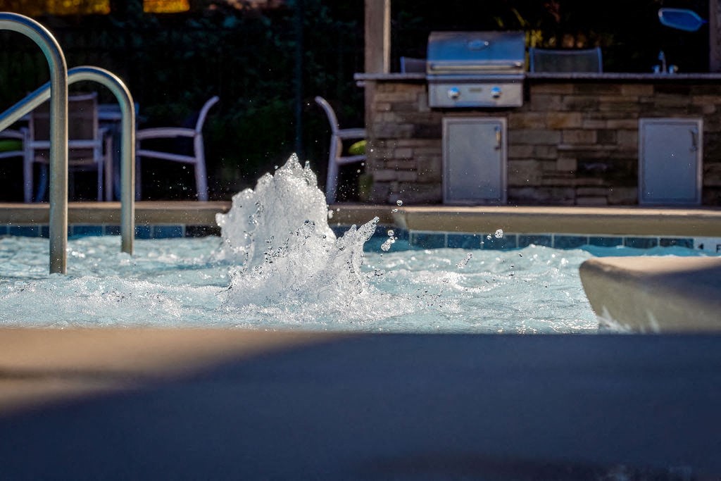a splash of water in a swimming pool