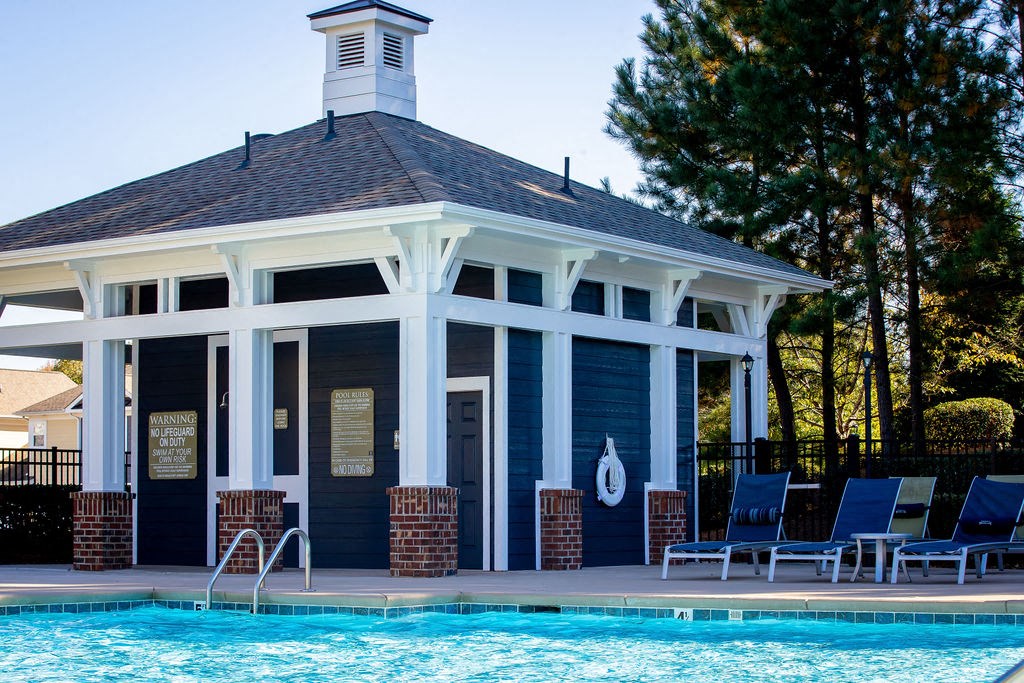 the pool house at the resort on a sunny day