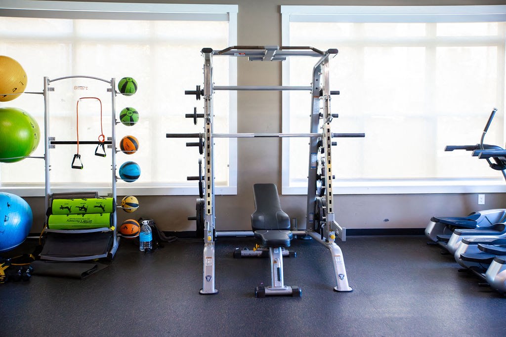 a gym with weights and other exercise equipment