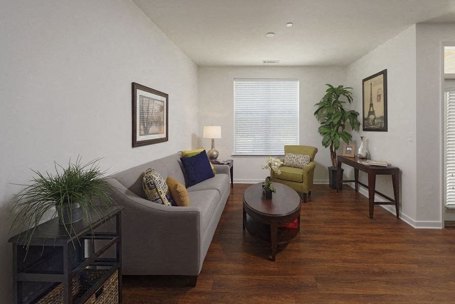 a living room with a couch and a table