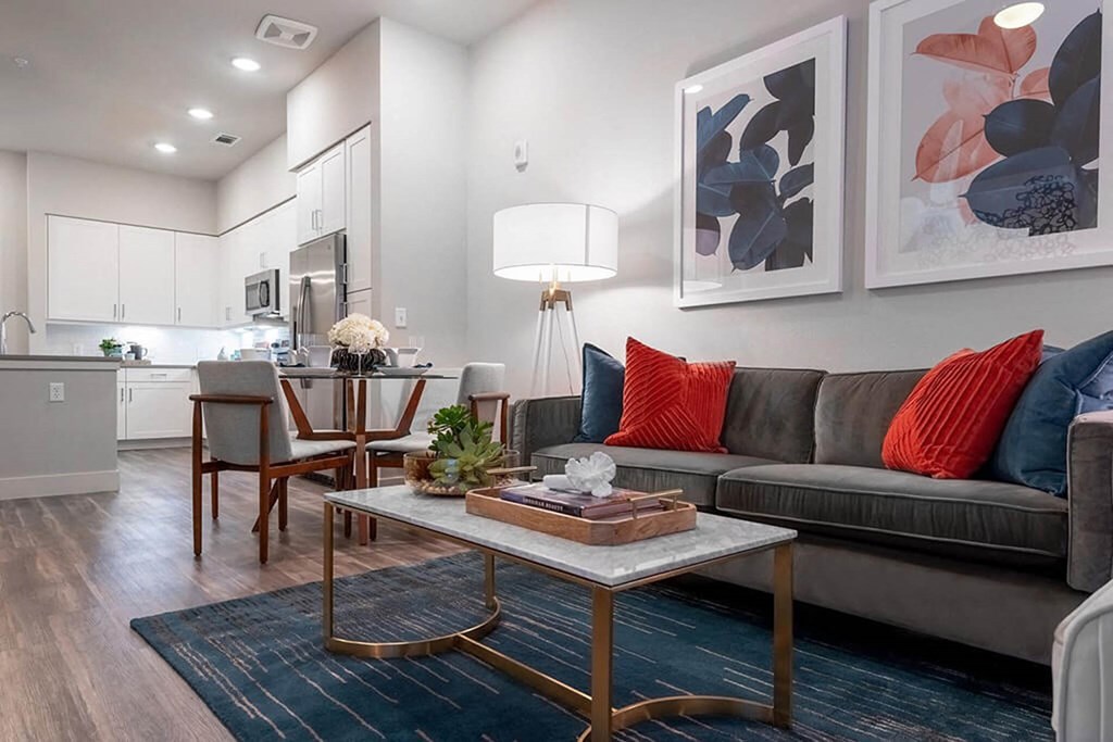 a living room with a couch and a table