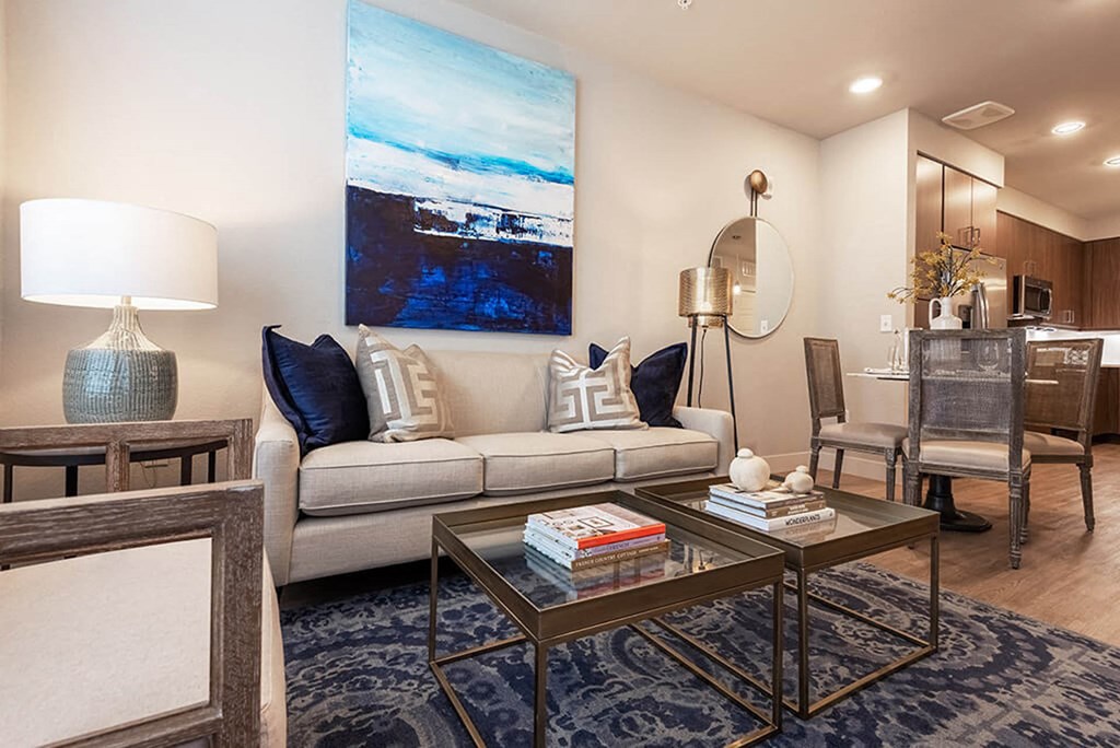 a living room with a couch and a table