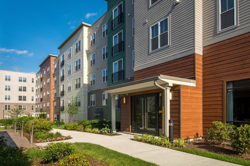 a building with a sidewalk in front of it