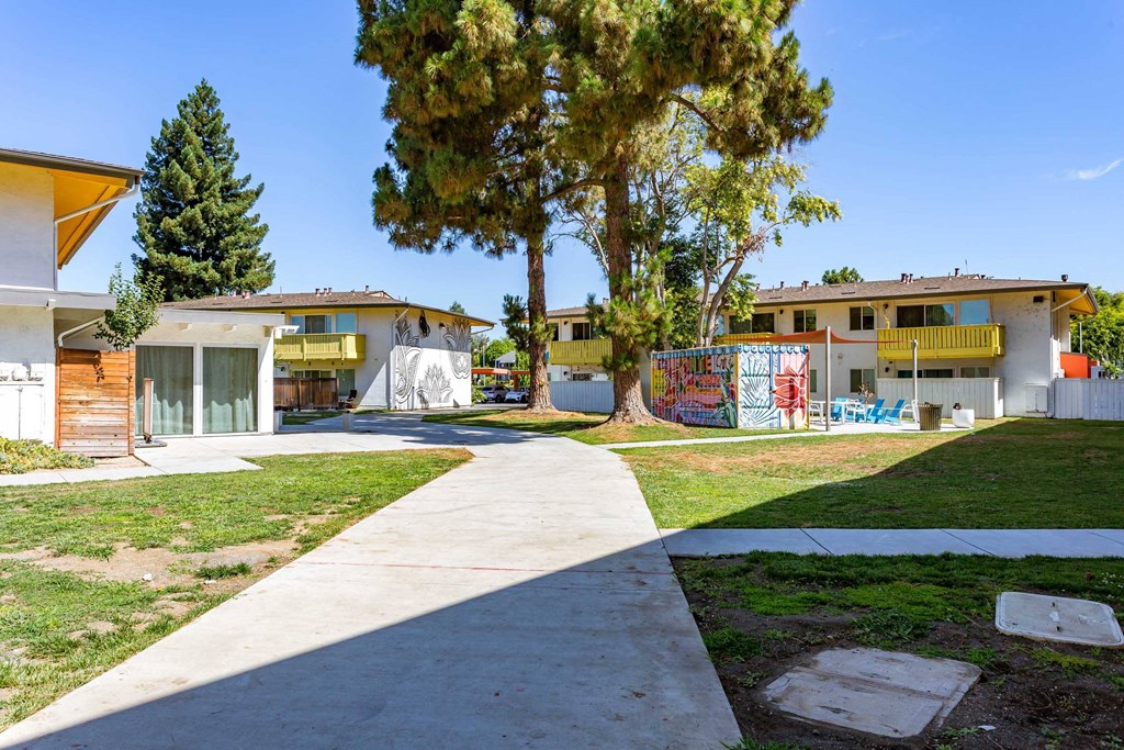 the neighborhood is full of buildings with graffiti on them