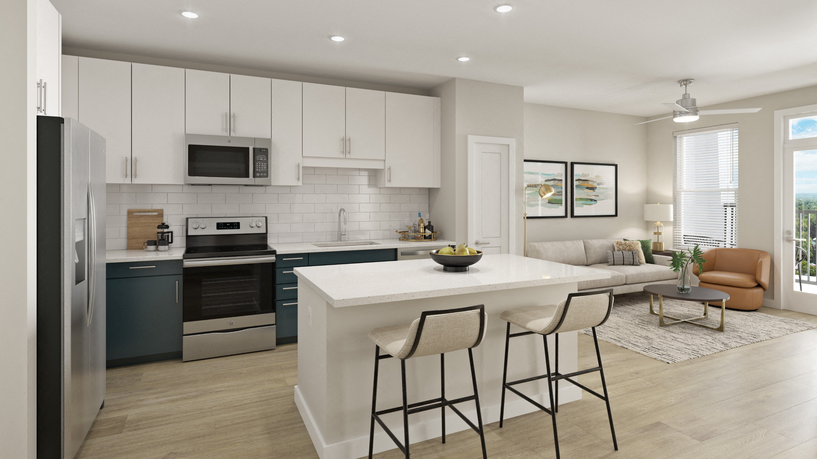 a kitchen and living room with an island and stools