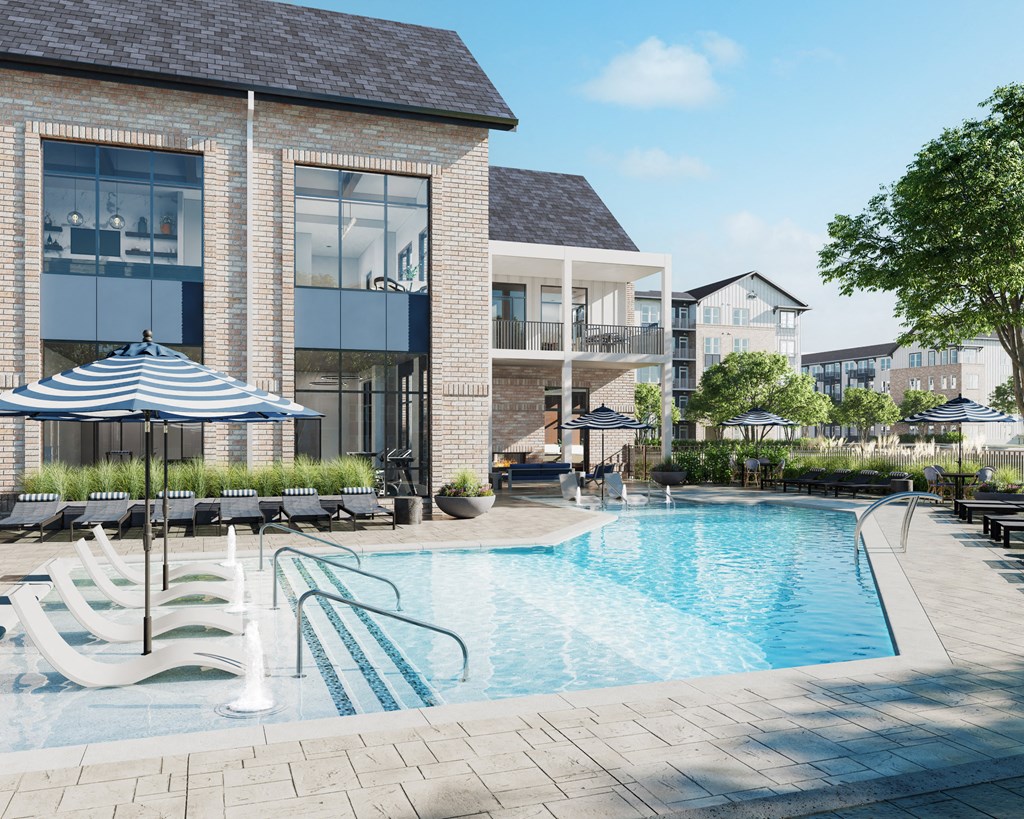a swimming pool with chairs and umbrellas in front of a building