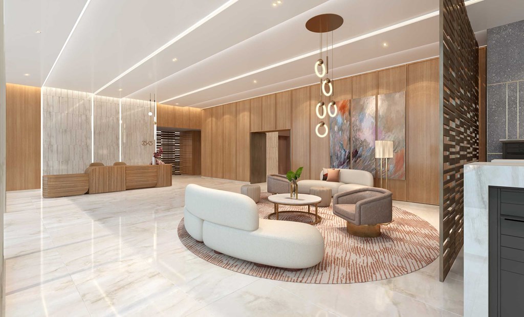 a rendering of a lobby with a couch and tables