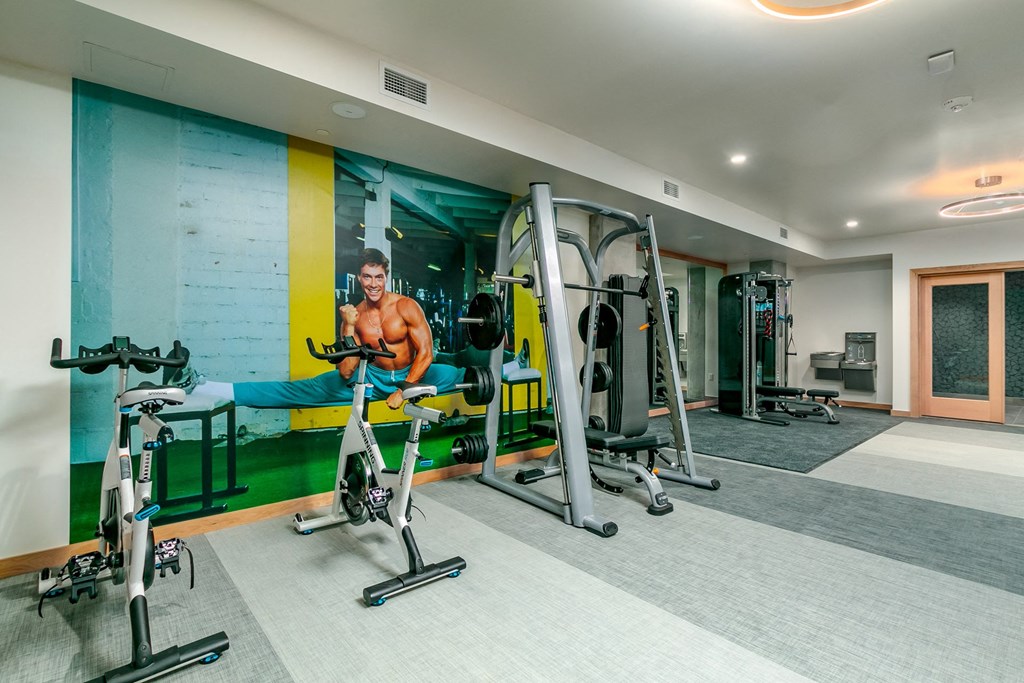 a man working out in the gym at the resort at longboat key club