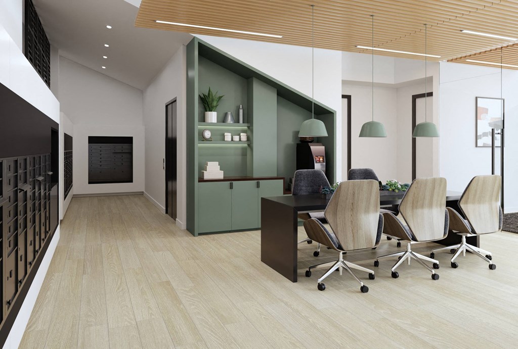 a modern office with a desk and chairs