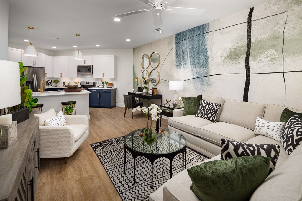a living room with couches and a table