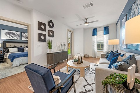 a living room with a couch and a table