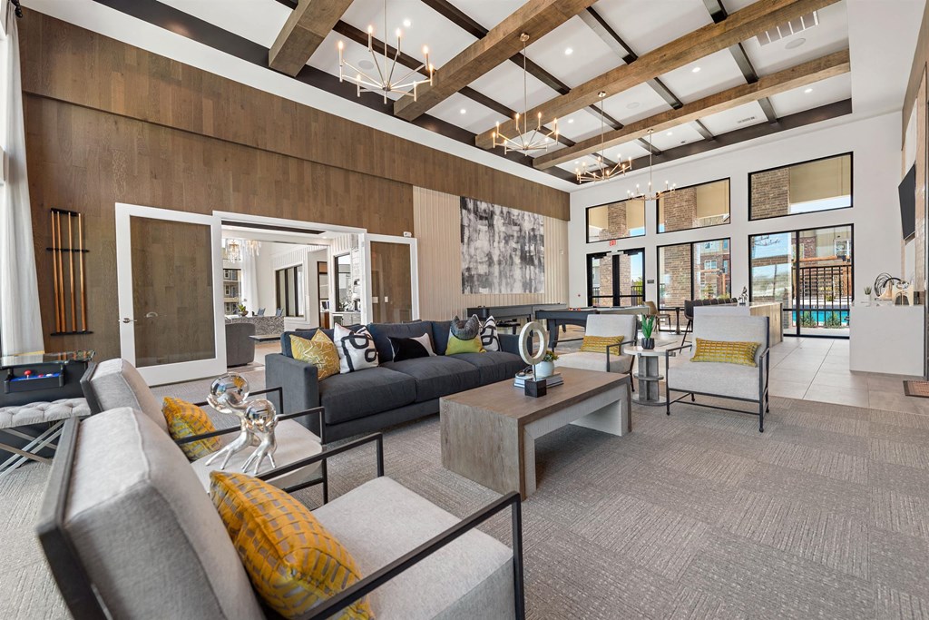 a living room with couches and a table