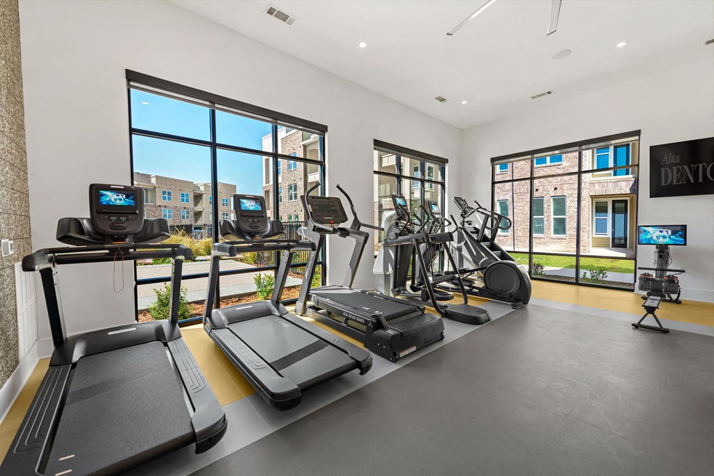 the gym is equipped with treadmills and other exercise equipment