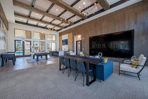 a large dining room with tables and chairs