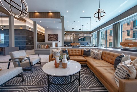 a lounge area with couches and a coffee table