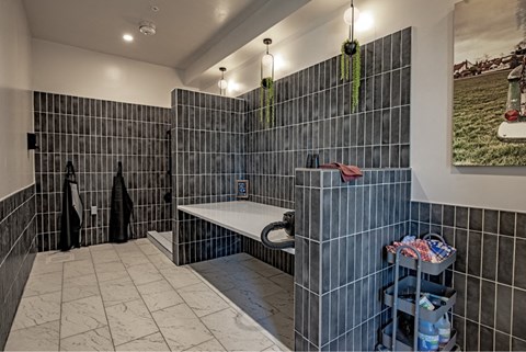 a large bathroom with a tub and a shower and a sink