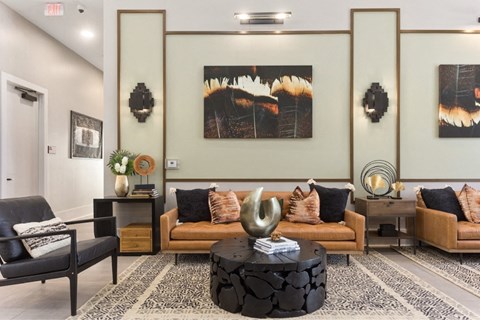 a living room with couches and a table