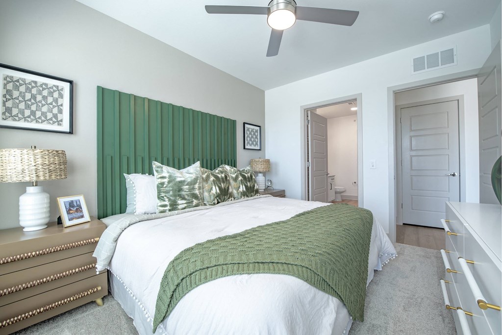 a bedroom with a bed and a closet