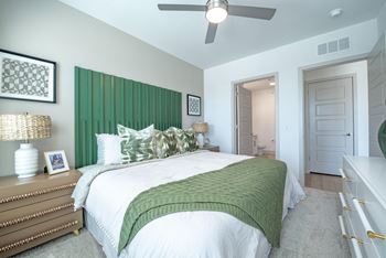 a bedroom with a bed and a closet