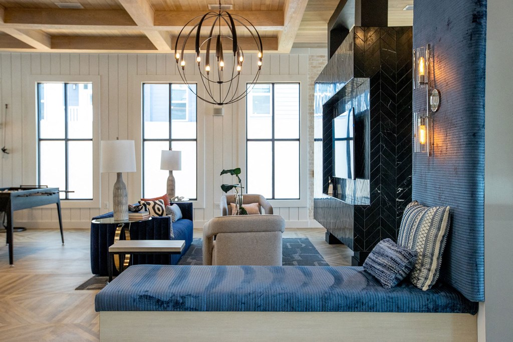 a living room with a couch and a fireplace