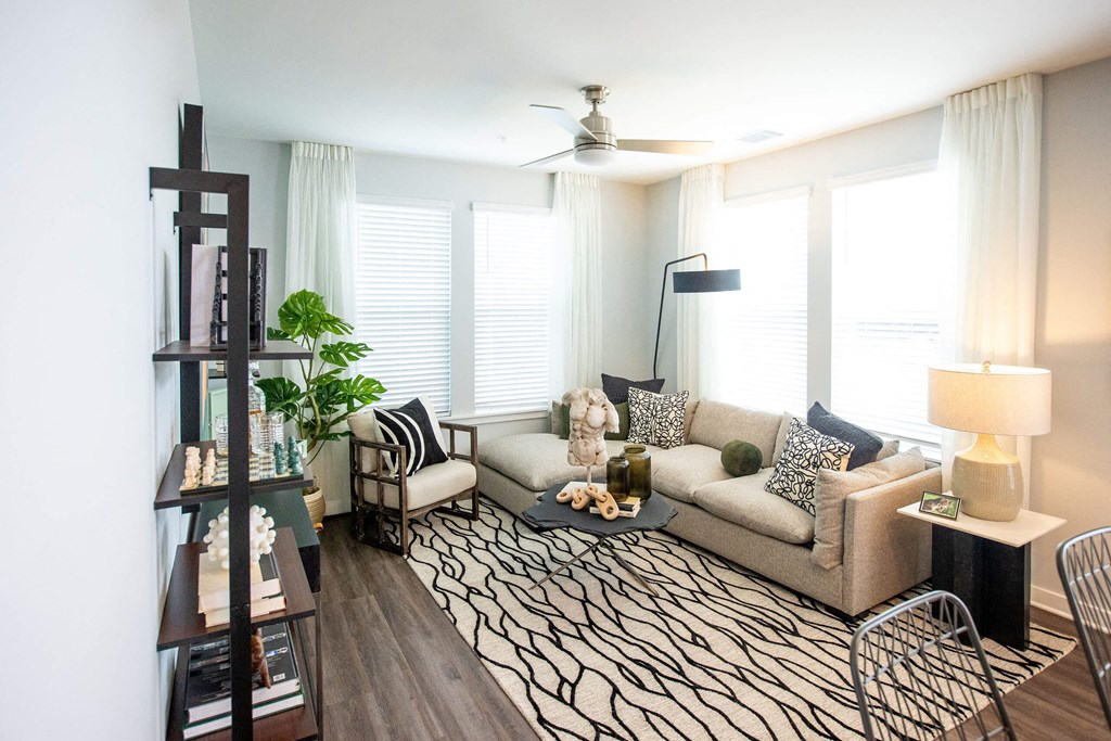 a living room with a couch and a chair