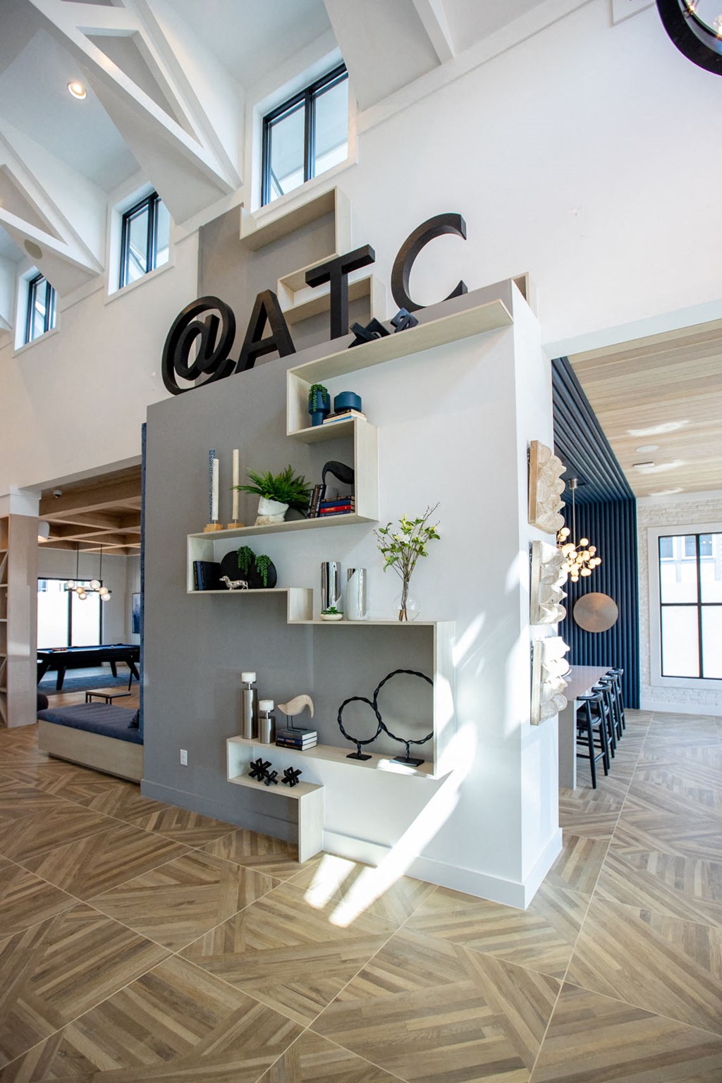 a wall with shelves and a sign on top of it