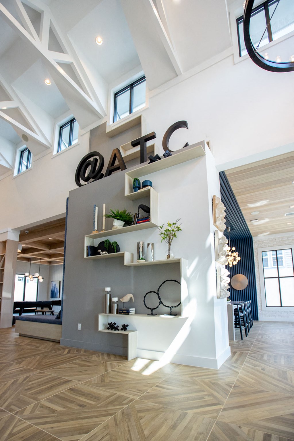 a large white room with a large sign on the wall