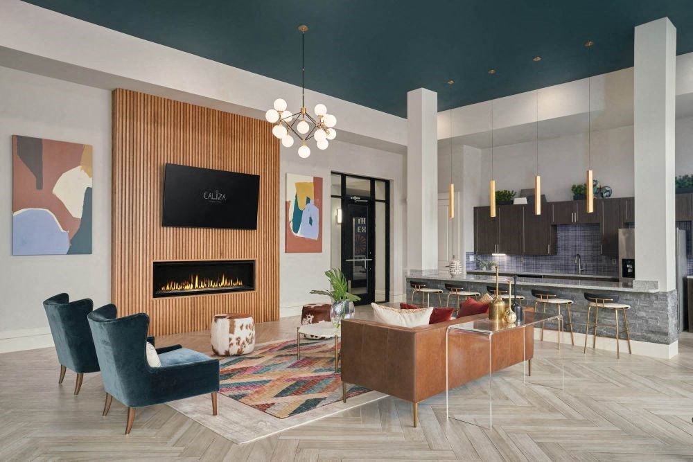 a rendering of a living room with furniture and a fireplace