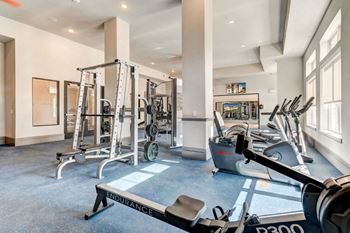 the gym is equipped with weights and other exercise equipment
