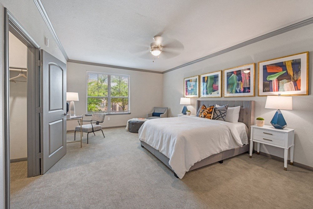 a bedroom with a bed and a closet