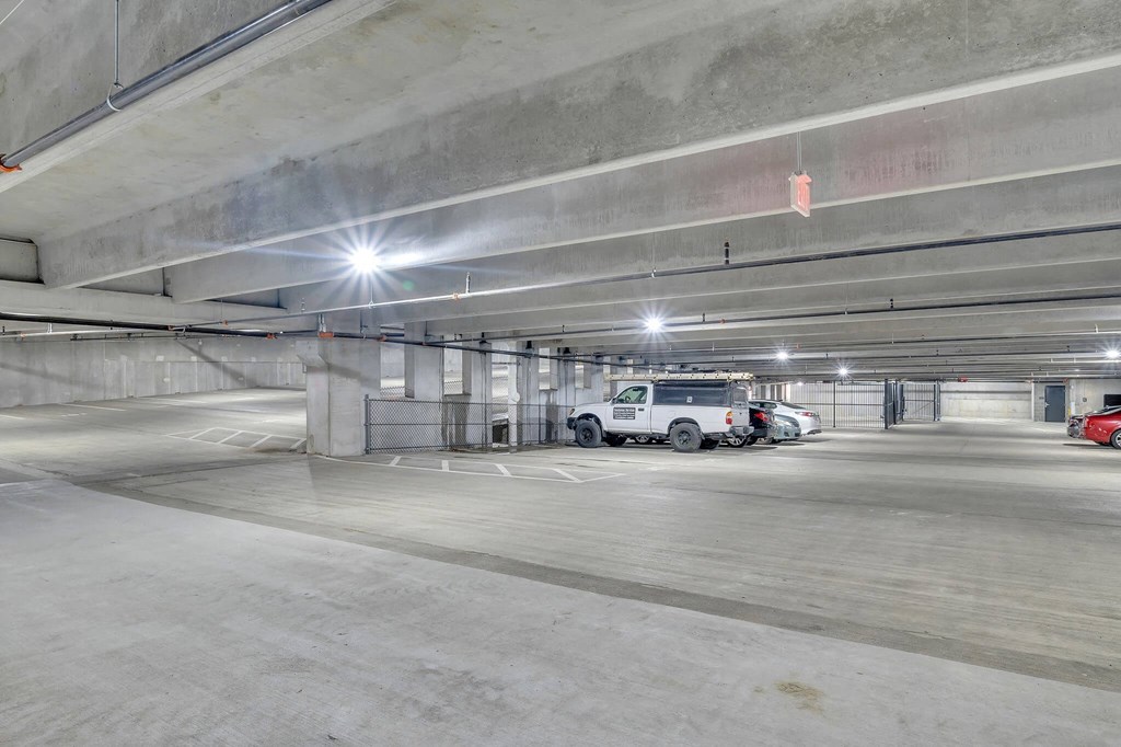 a parking garage with cars parked in it