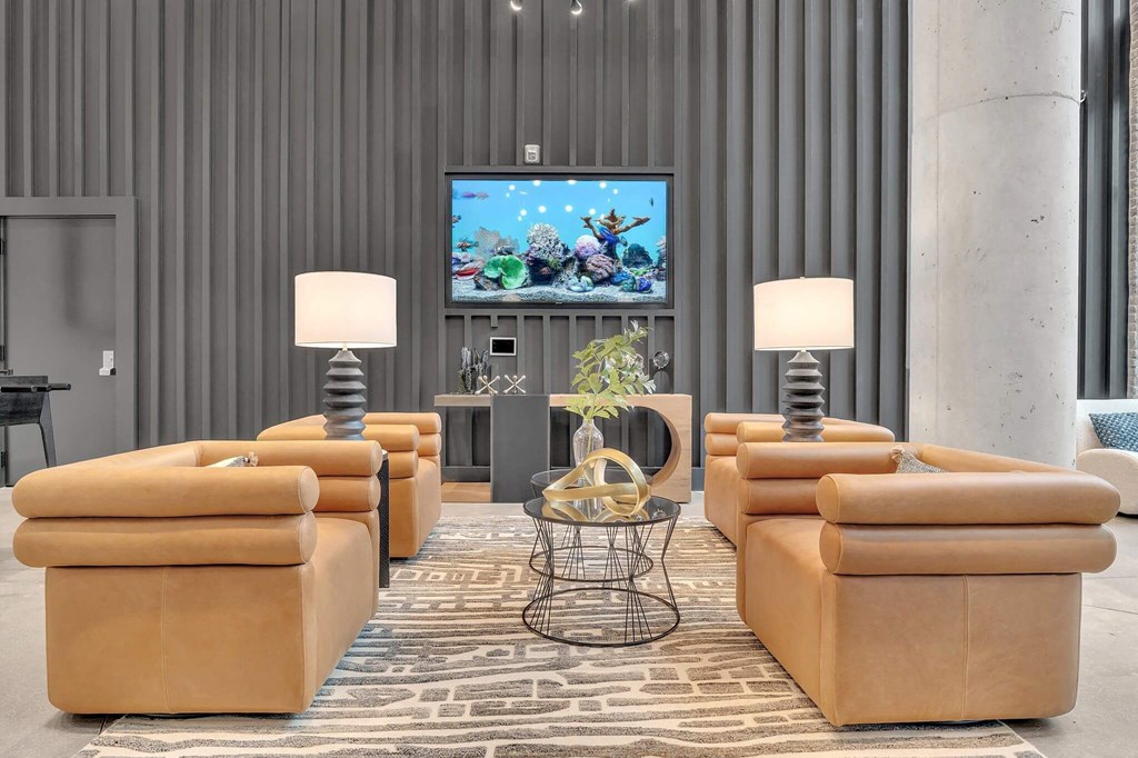 a living room with couches and a tv