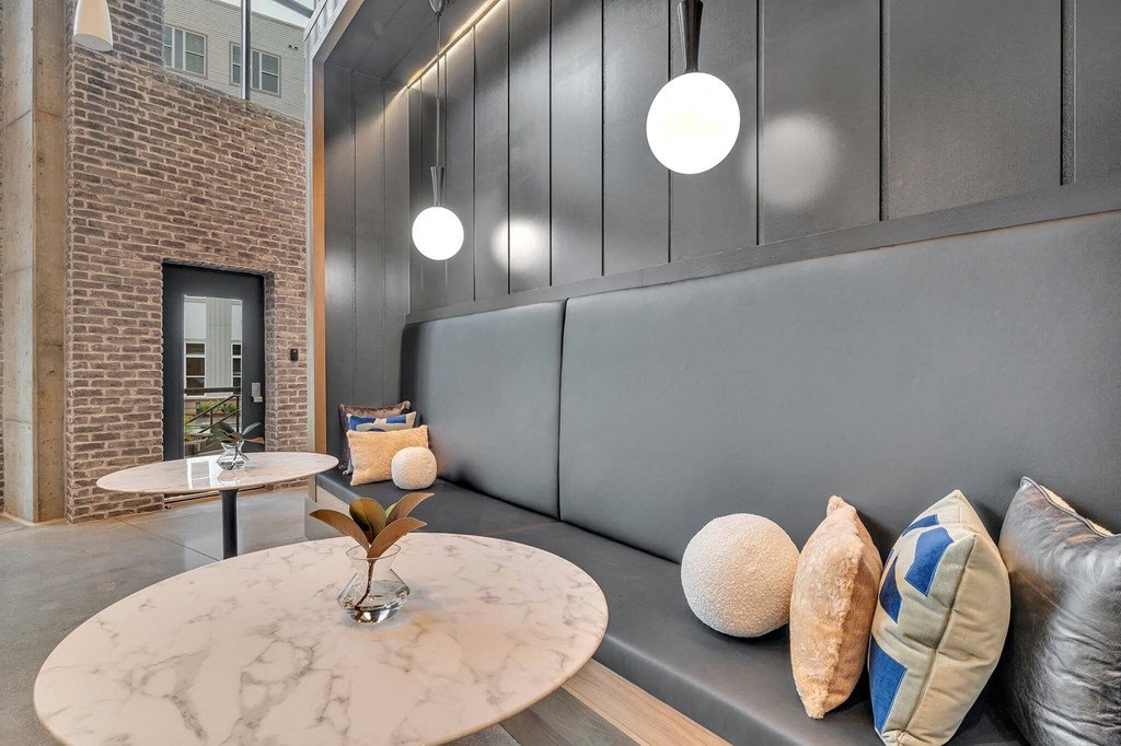 a living room with couches and a table