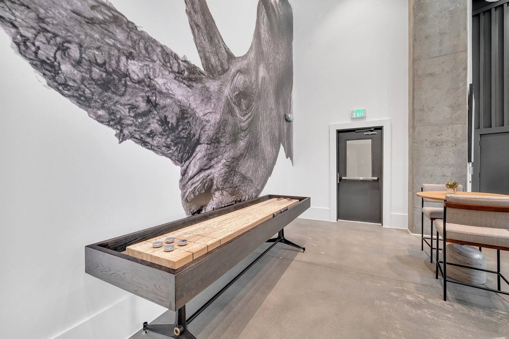 a foosball table in a room with a large