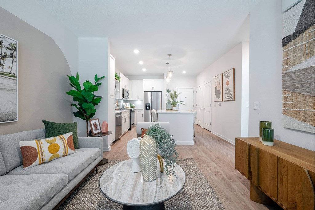 a living room with a couch and a table