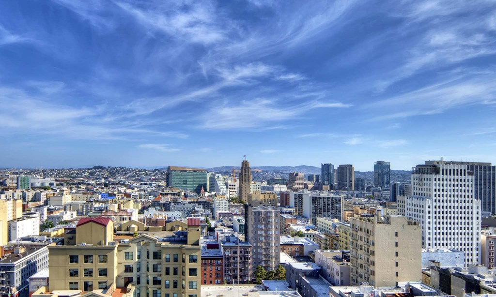 a view of the city from the top of a skyscraper