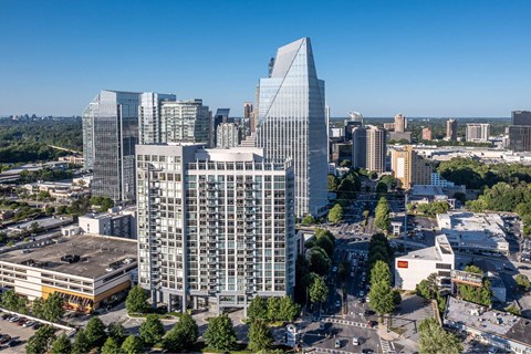 an aerial view of skyscrapers in the city