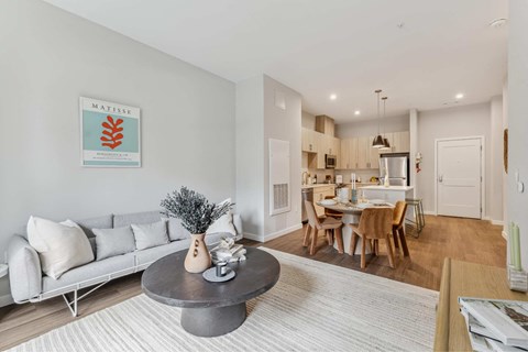 a living room with a couch and a table