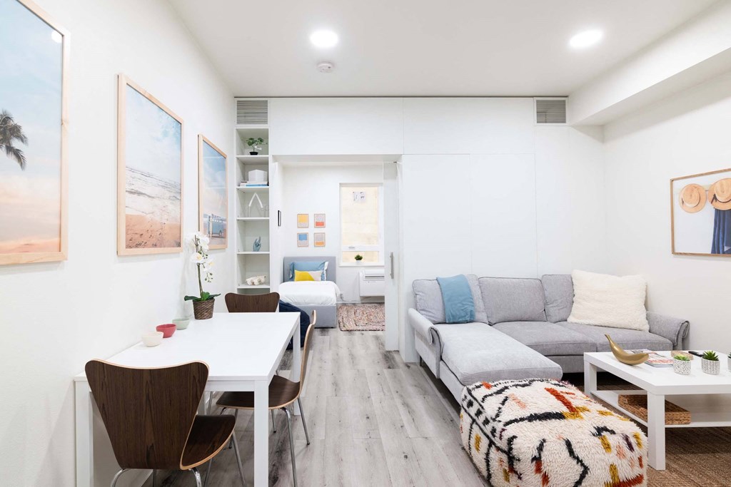 a living room with a couch and a table