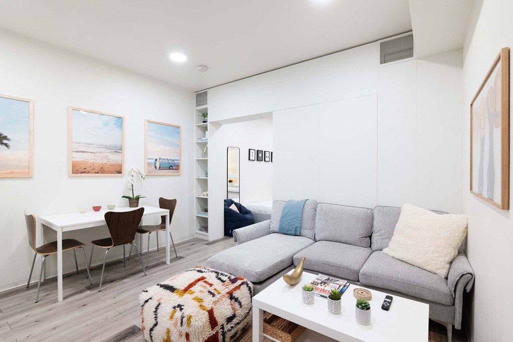 a living room with a couch and a table