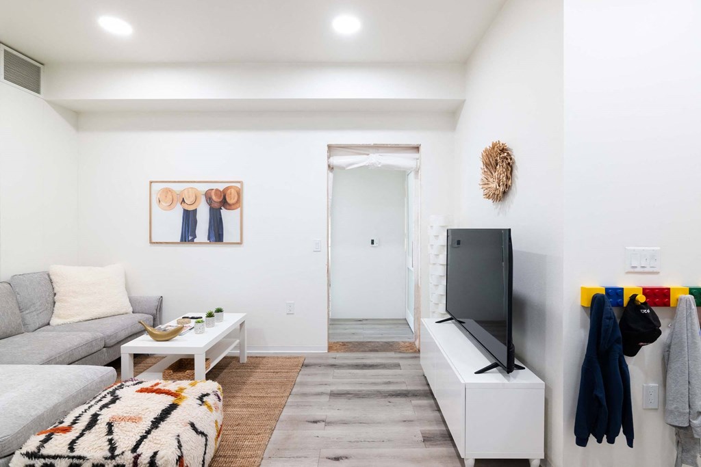 a living room with a couch and a television