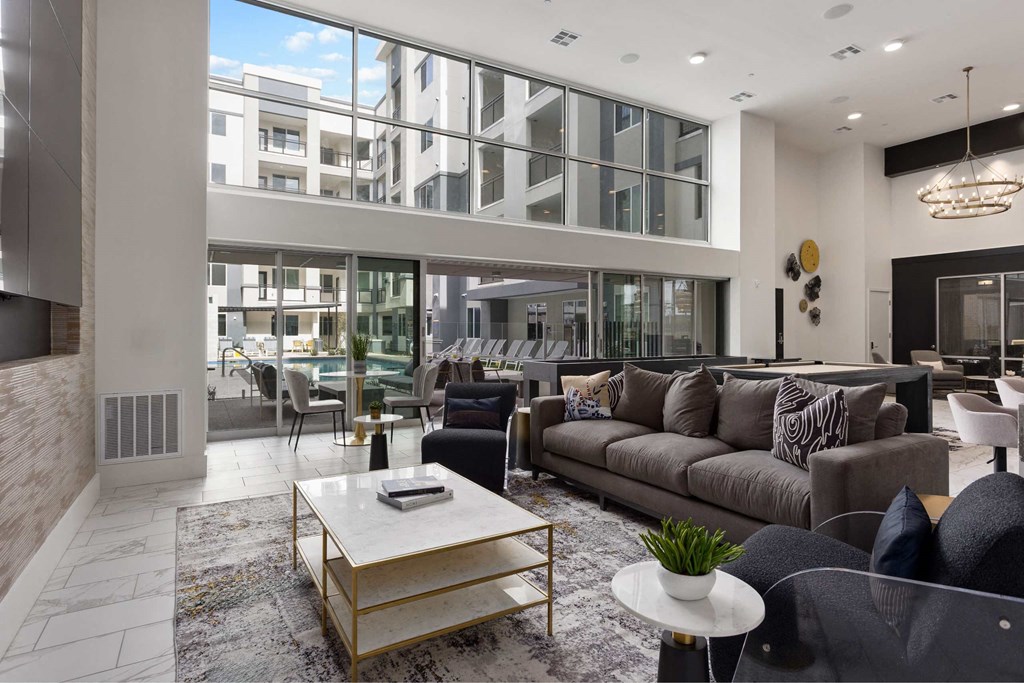 a living room with a couch and a table