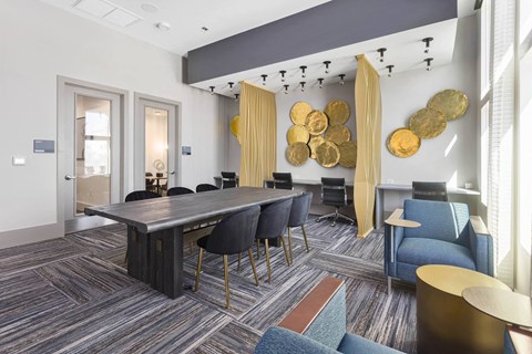 a conference room with a large table and chairs