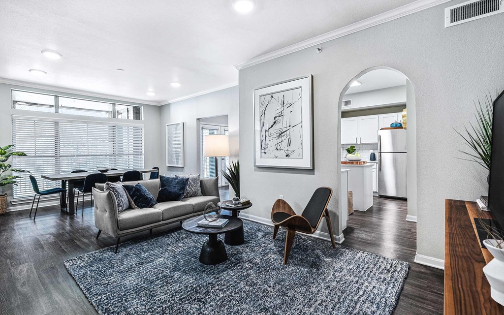 a living room with a couch and a table