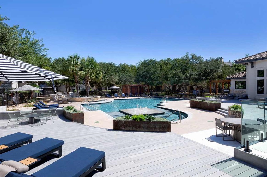 a pool and patio area at the resort at napoleon