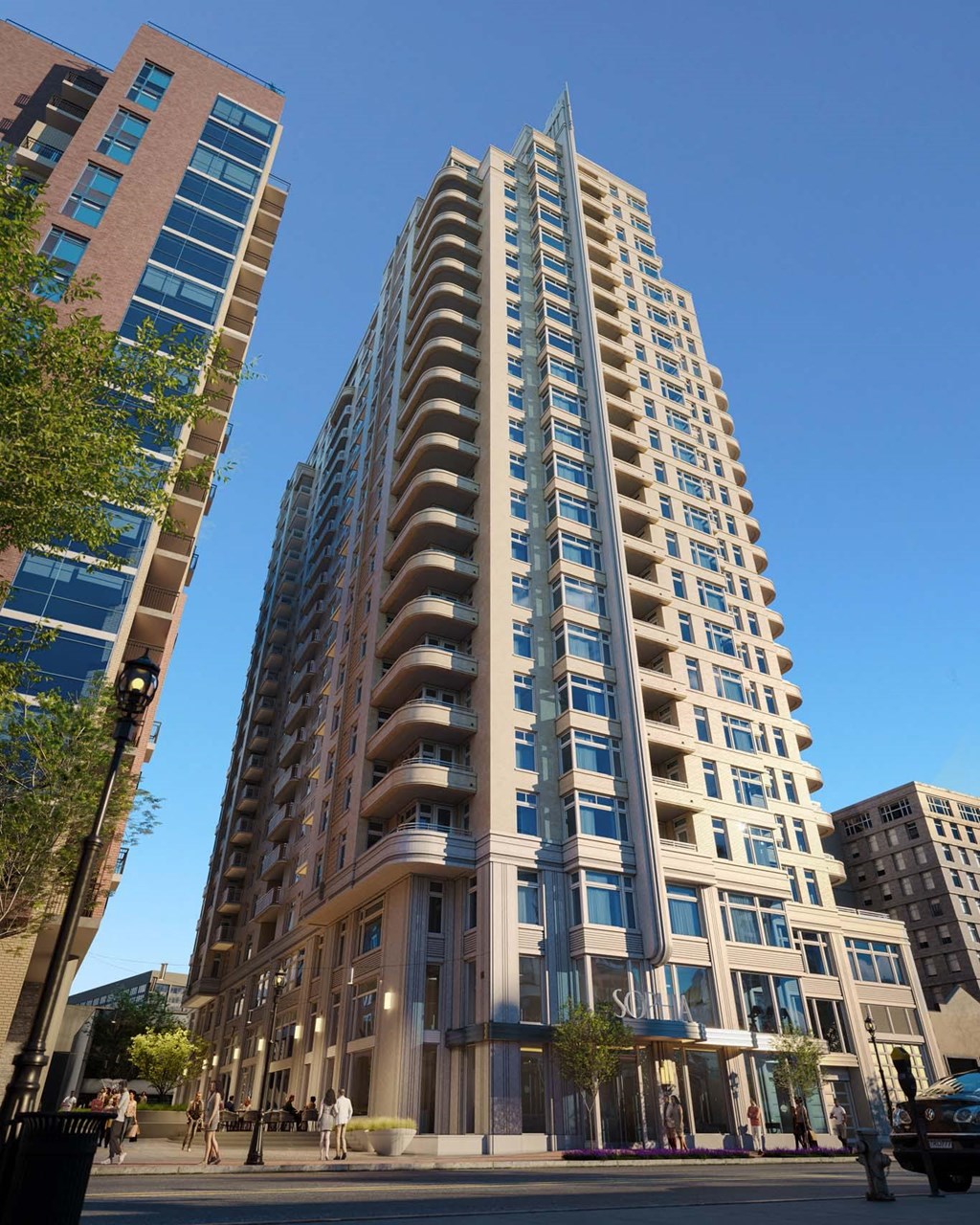 an apartment building on the corner of a city street