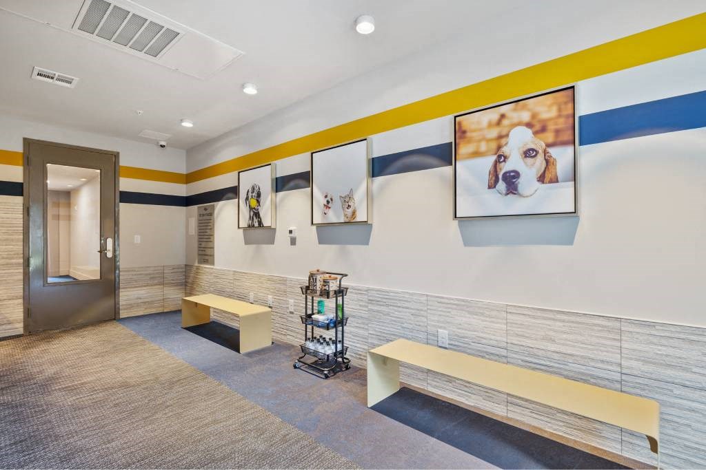 the lobby of a hospital with a dog on the wall