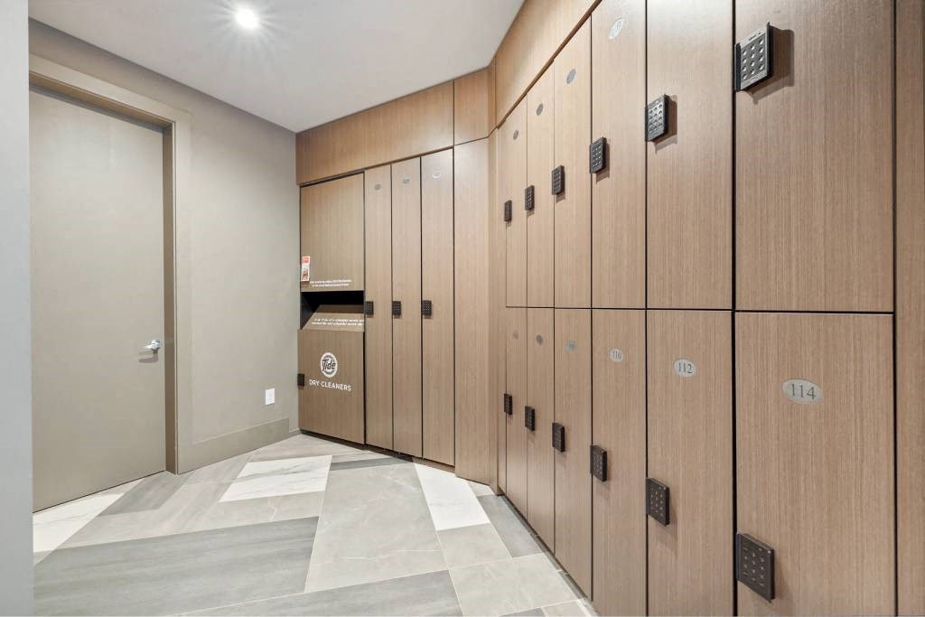 a row of wooden lockers in a locker room in a building