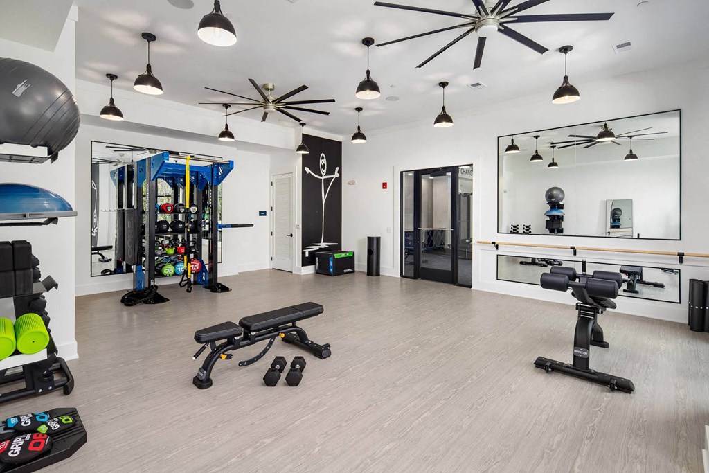 the gym at the flats at big tex apartments