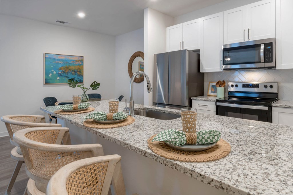 a kitchen with a granite counter top